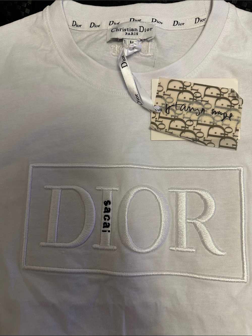 Exclusive Dior White T is collaboration between luxury fashion houses Dior/Sacai